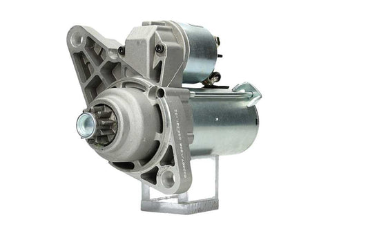A new 12V starter motor with a 1.1KW power rating built for Volkswagen, seat, skoda and audi vehicles, displaying the metal body and electrical connectors.