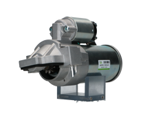 A new 12V Ford starter motor with 2.2 kW power and 11 teeth, visible mounting points, and electrical connectors.