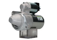 A new 12V Hyundai / kia starter motor 1.8 kw, with a metallic finish and electrical connectors.