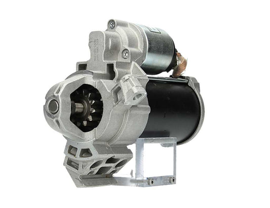 A new 12V 1.4KW BMW starter motor with a silver and black color scheme.