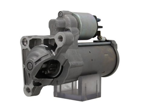 A new 12V 1.7KW starter motor with 12 teeth for Citroën, Opel, Vauxhall and Peugeot vehicles, showing a metallic body with a solenoid and electrical connectors.