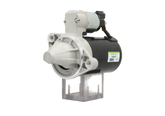 A new 12V starter motor with 8 teeth for Hyundai / Kia vehicles, with a metallic body and a label indicating 0.8 kw power.