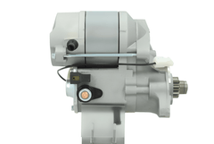 side view of A new 12V Kubota starter motor with a silver and gray color, 1.2KW and 9 teeth featuring various electrical connectors and mounting points.