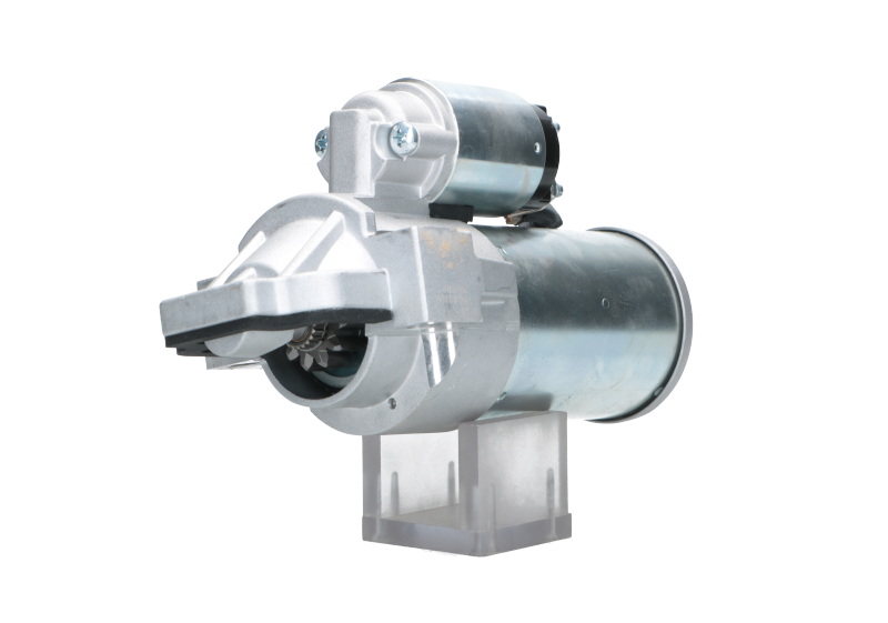 A new 12V starter motor for Ford vehicles, 2.2KW with 11 teeth displaying metallic surfaces and a robust design.