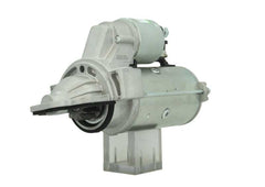 A 12V silver starter motor 2.2kw for a Ford vehicle, 12 teeth.