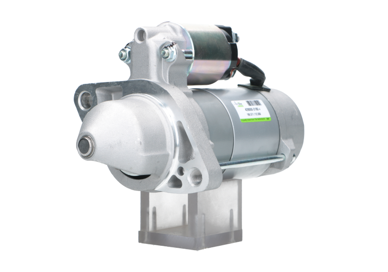 A new 12V Toyota 2.0 kw starter motor with 11 teeth built for vairous toyota models, displayed against a plain background