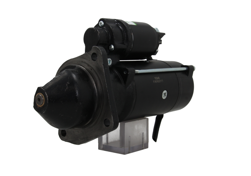 A black starter motor for a vehicle, with visible mounting points and electrical connectors.