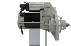 side view of A new 24V starter motor with a 4.5KW power rating for Isuzu vehicles, showing the body and electrical connectors.