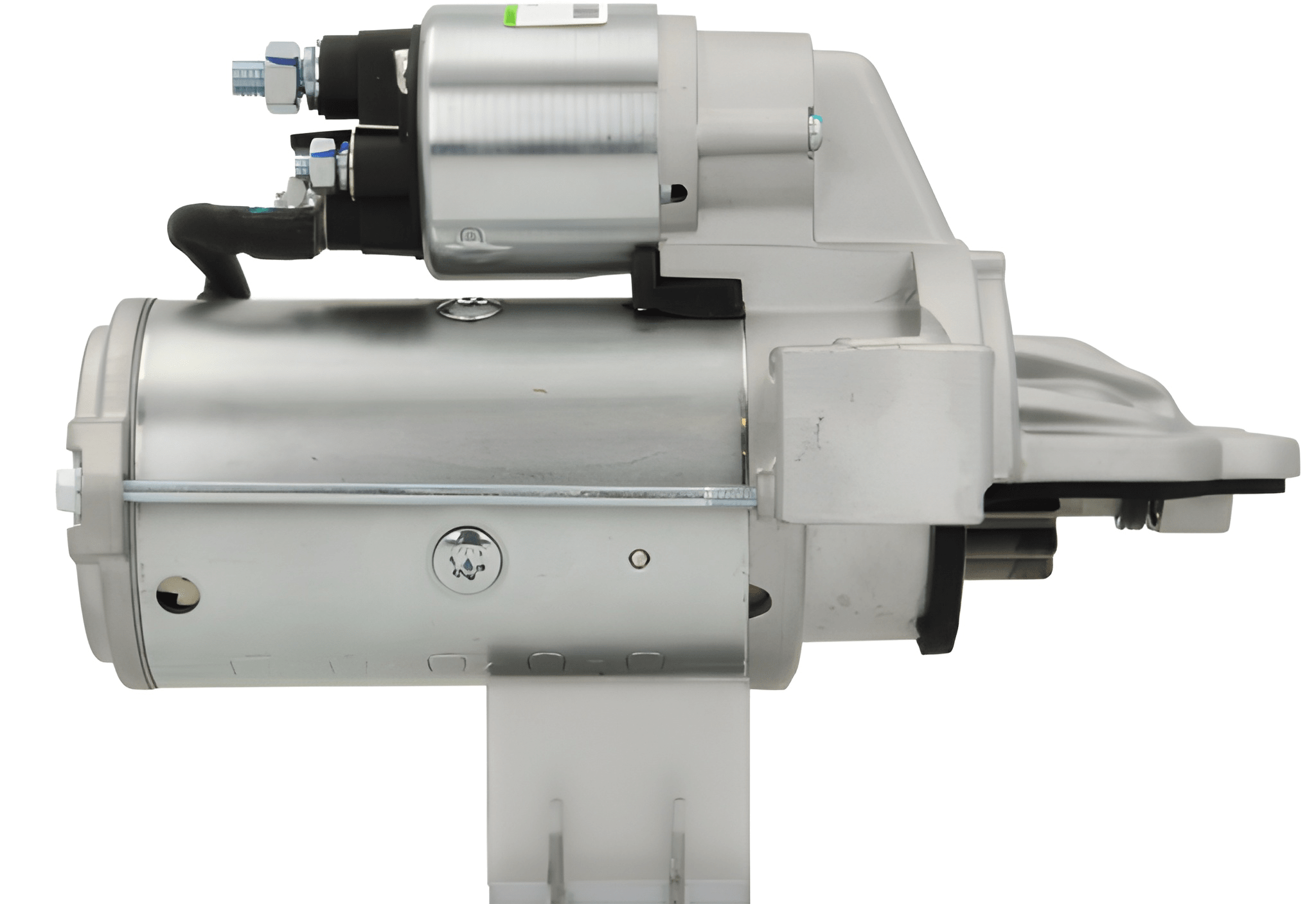 side view of A new 12V Ford starter motor with a 2.2 kW power rating and 12 teeth, displaying the front view with a silver and gray color.