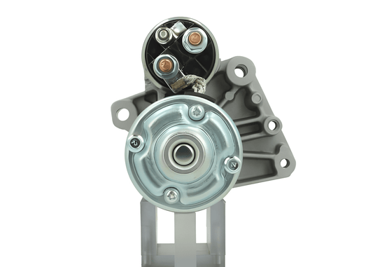 back view of A new 12V starter motor 1.7Kw with 11teeth for Citroën, Peugeot, Toyota, Audi, volkswagen and suzuki vehicles, featuring a metallic body with a black and silver color scheme.