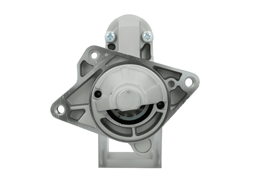 front view of A new 12V starter Renault 2.2 kw, with a metallic body, electrical terminals, and a mounting flange.