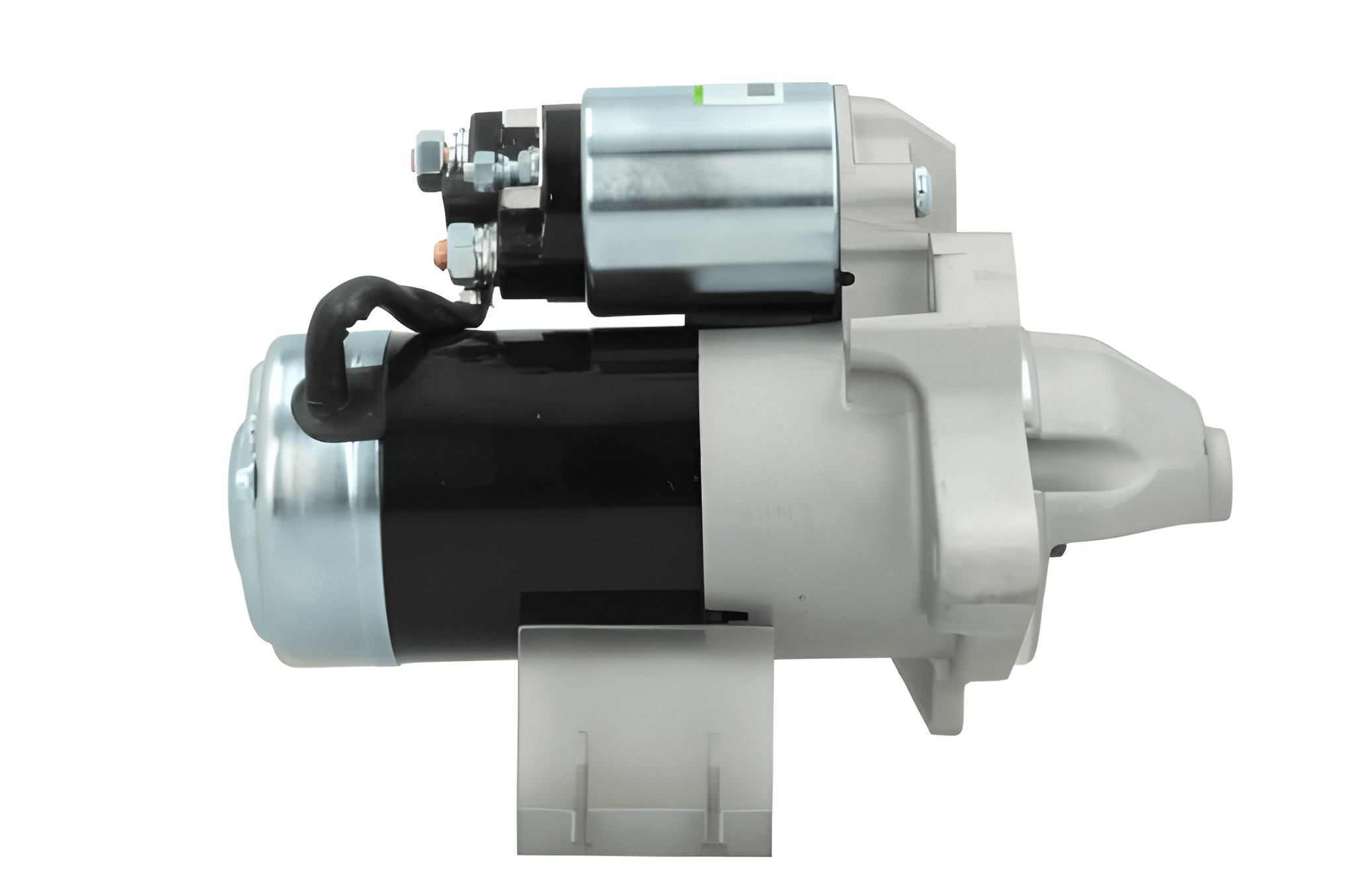 side view of A new 12V starter Renault 2.2 kw, with a metallic body, electrical terminals, and a mounting flange.