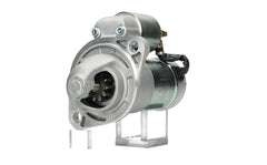 A new 12V Yanmar starter motor 1.2KW for vehicles, 11 teeth, displaying metal components and a silver color.