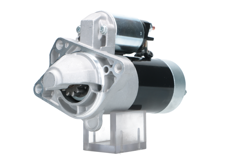 A new 12V starter motor for Renault, Nissan, Vauxhall and opel vehicles with a power of 2.2 kw and 11 teeth, showing a metal body with a black and silver color scheme, designed for a vehicle's ignition system.