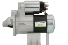 side view of A new 12 teeth aftermarket starter motor for Renault, nissan, dacia and mercedes vehicles, with a 1.4 kW power rating and 12V voltage.