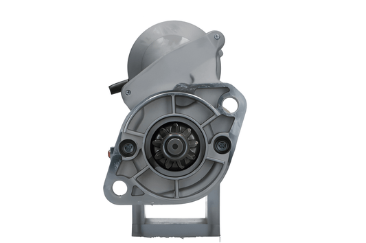 front view of A new Kubota starter motor with a 1.4 kW power rating, showing a metallic body with electrical connectors and a label.