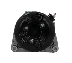 rear view of A new aftermarket alternator for Land Rover vehicles, featuring a metal body with fin design for cooling, a pulley, and mounting holes.